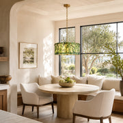 Green Marble Drum Pendant installed above a dining table