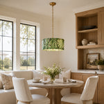 Green Marble Drum Pendant installed above a dining table