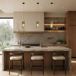 Green Pinwheel Four-Panel Marble Pendant installed above a kitchen island
