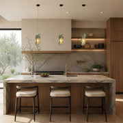 Green Pinwheel Four-Panel Marble Pendant installed above a kitchen island