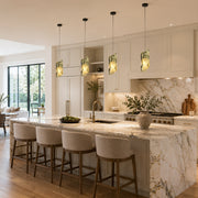 Green Pinwheel Four-Panel Marble Pendant installed above a kitchen island