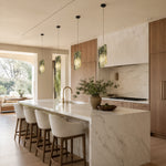 Green Pinwheel Four-Panel Marble Pendant installed above a kitchen island