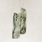 Product detail of Green Pinwheel Four-Panel Marble Pendant against a neutral background