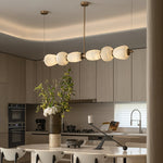 Handcrafted Alabaster Pebble Linear Chandelier – Gold & White LED by Dalmivik, product or room detail view