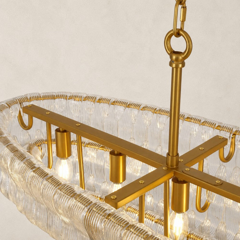 Inner support frame of the clear glass linear chandelier.