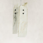 Product detail of Ivory Four-Panel Marble Pendant against a neutral background