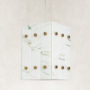 Product detail of Ivory Veined Twelve-Panel Marble Lantern Pendant against a neutral background