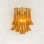 Layered curved glass wall sconce