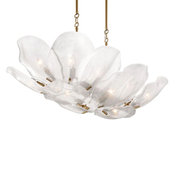 Elongated white glass petal chandelier with brass-tone details seen at an angle.