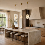 Layered Ivory Marble Disc Pendant installed above a dining table