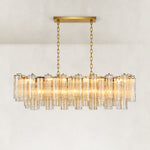 Layered linear glass chandelier with two chains and a rectangular ceiling canopy.