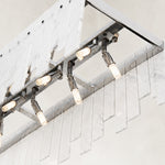 Layered Marble Panel Island Pendant displayed in a bathroom interior