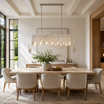 Layered Marble Panel Island Pendant installed above a dining table