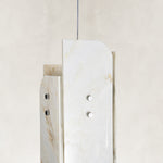 Product detail of Layered White Marble Blade Pendant against a neutral background