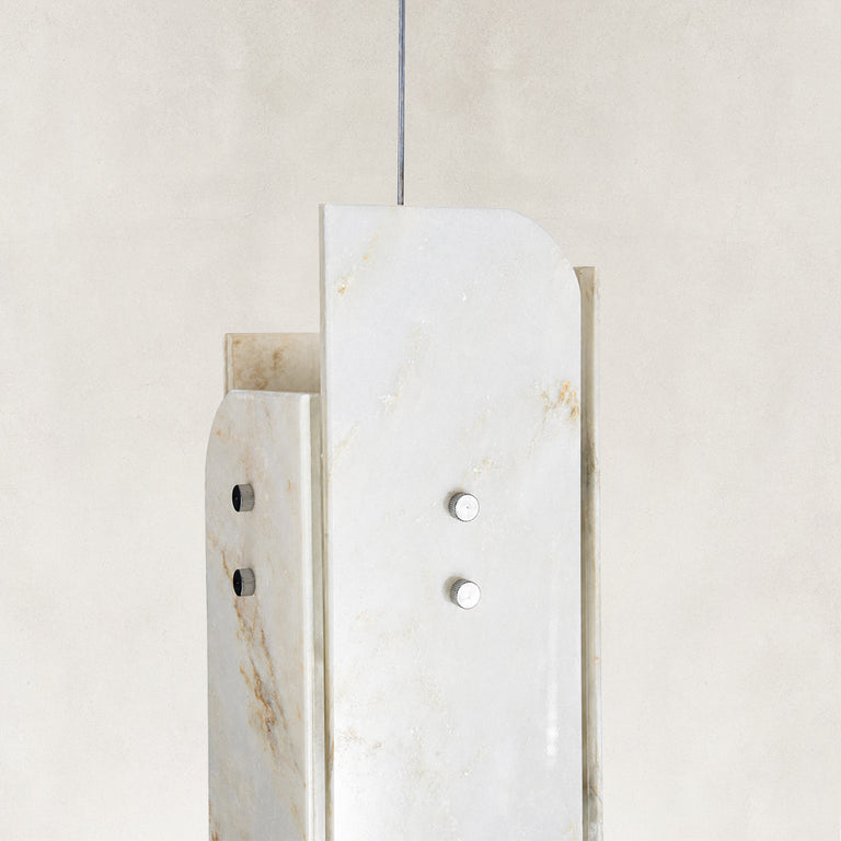 Product detail of Layered White Marble Blade Pendant against a neutral background