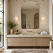Layered White Marble Disc Pendant displayed in a bathroom interior