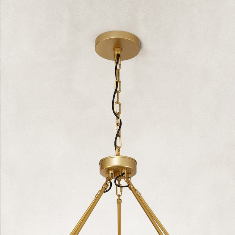 brass-tone two-tier glass-tube chandelier canopy detail.