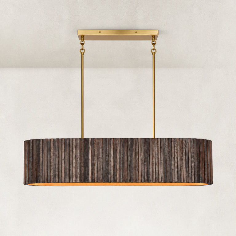 Dark linear ribbed wood chandelier with a gold-tone interior and two suspension rods.