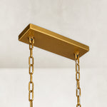 Rectangular ceiling canopy and twin chains of the linear glass chandelier