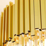 Detail of the long chandelier's gold-tone crown fins.