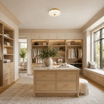 Low-profile textured glass flush mount in a dressing room