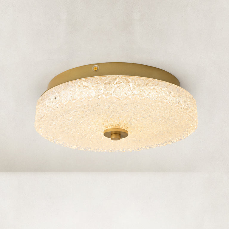 Illuminated low-profile textured glass flush mount shown from below