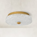 Unlit low-profile textured glass flush mount with brushed-gold ceiling plate