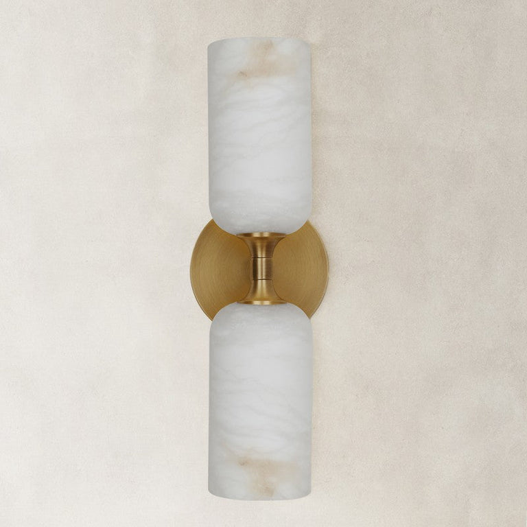 brass-tone twin-cylinder wall sconce shown unlit.