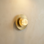 Eclipse Orb Triple Halo Alabaster Wall Sconce by Dalmivik, complete fixture view
