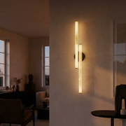 Linear Rod Crossed Alabaster Tubes Wall Sconce by Dalmivik, complete fixture view