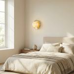 Eclipse Orb Curved Brass Disc Alabaster Wall Sconce by Dalmivik, product or room detail view