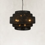 Black woven drum chandelier fixture detail.