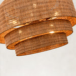 Natural woven drum chandelier fixture detail.