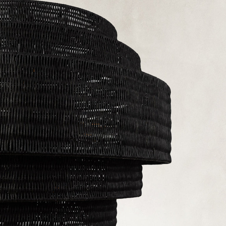Black woven drum chandelier fixture detail.