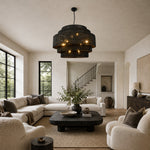 Black woven drum chandelier room scene.