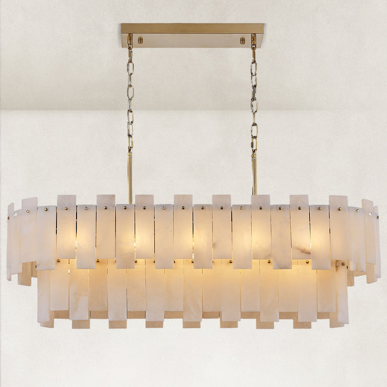 Complete illuminated front view adding full twin chains and rectangular canopy beyond the cropped old main.