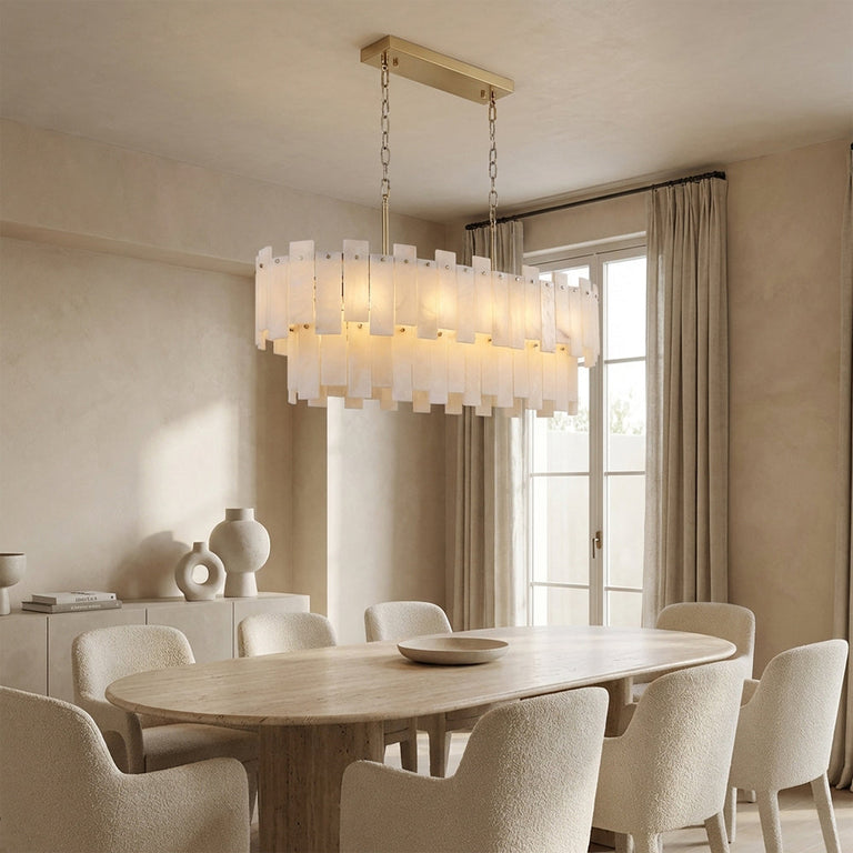 Matching complete two-tier fixture above oval/round dining table near window