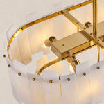 Inner gold-tone frame, suspension attachment and white-panel connections.