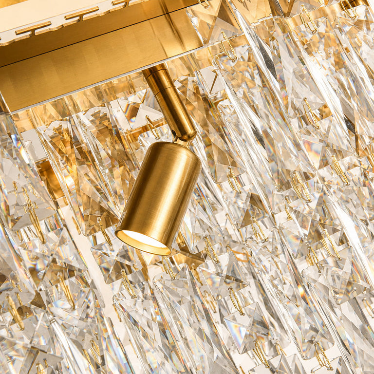 Gold-tone oval crystal chandelier, crystal and holder close view.