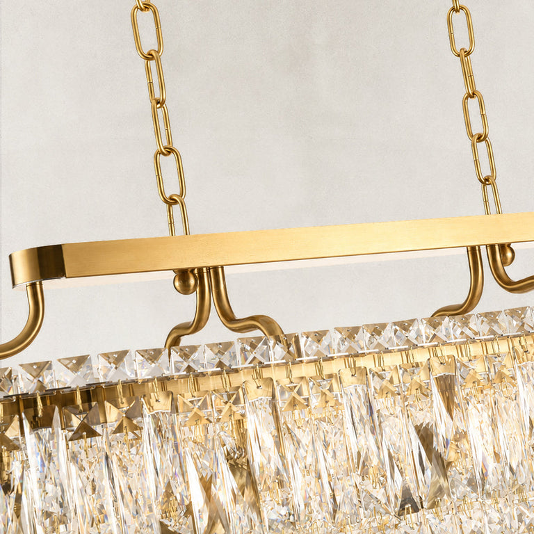 Gold-tone oval crystal chandelier, curved gold-tone support connection.