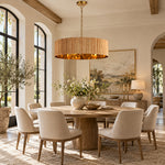 Oak ribbed drum chandelier suspended in a room