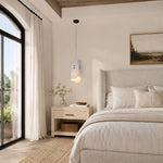 Offset White Marble Blade Pendant installed beside a bed in a furnished bedroom