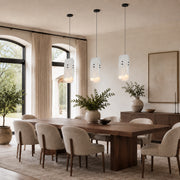 Offset White Marble Blade Pendant installed above a dining table