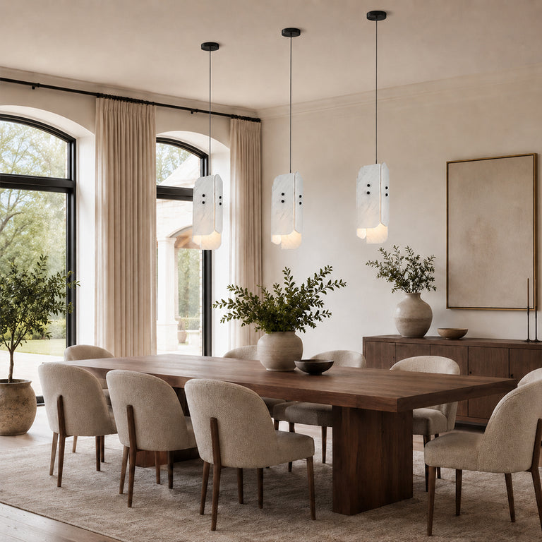 Offset White Marble Blade Pendant installed above a dining table