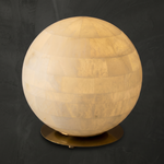 Orbita Alabaster Sphere Table Lamp 11.8" by Dalmivik, complete fixture illuminated