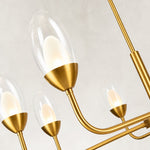 Gold-tone glass chandelier, eight-light arm and glass.
