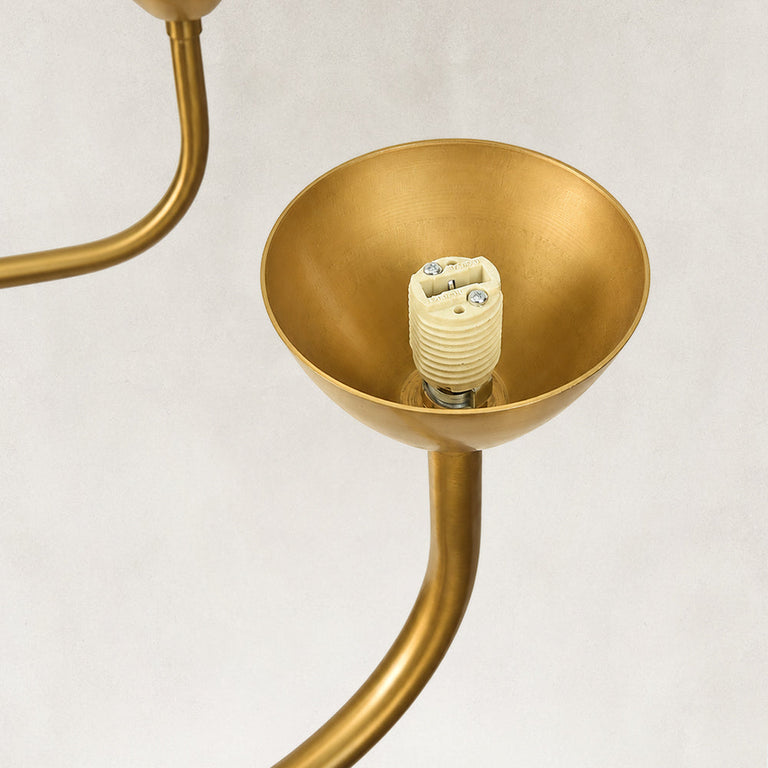 Gold-tone glass chandelier, eight-light empty holder.