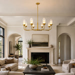 Gold-tone glass chandelier, eight-light fireplace living room.