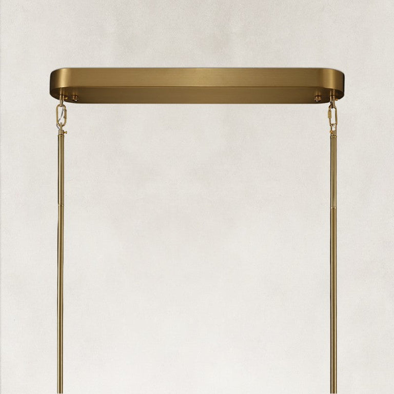 Brass-tone oval chandelier canopy and suspension rods.