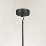 Black chandelier canopy and suspension rod.
